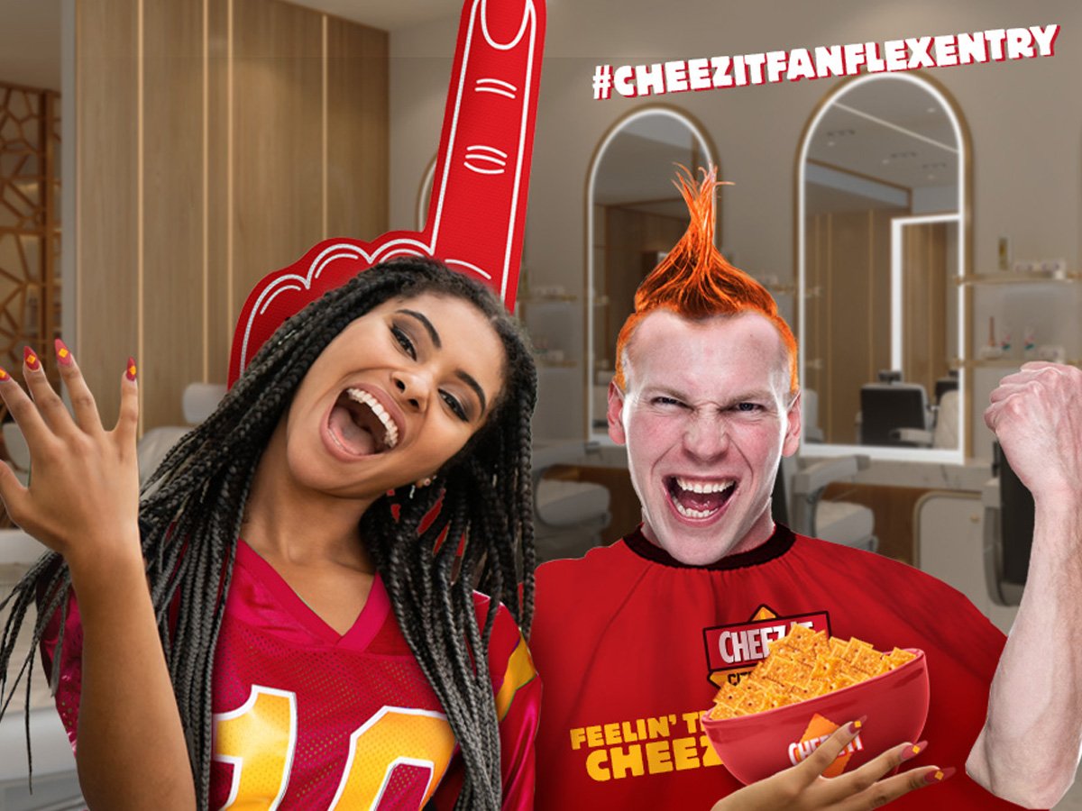 Two smiling people in Cheez-it fan clothing