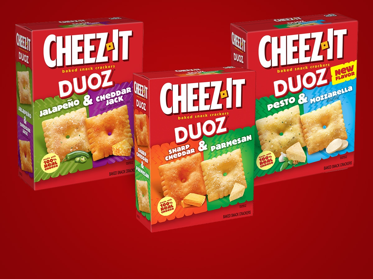 Three Cheez-It boxes on a red background