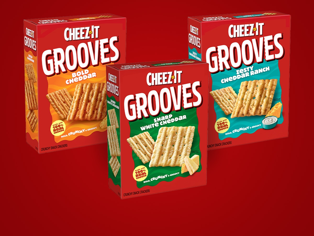 Three Cheez-It boxes on a red background